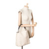 Louis Vuitton Babylone White LV Handbag side