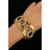 Chanel Coco Metal and Rhinestone Goldtone Bracelet on wrist