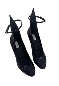 Alaia Decollete A shaped Pumps in black patent leather