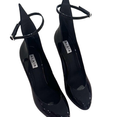 Alaia Decollete A shaped Pumps in black patent leather
