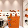 Hermes In The Loop 18 Orange Clemence Swift Palladium hardware