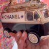 Side of Chanel Mini Van Black White Gold Minaudiere 2024 Cruise Bag Plexiglass