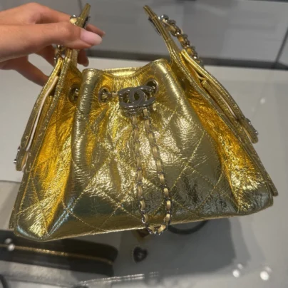 2026 Chanel 25 Mini Hobo Metallic Gold Drawstring Quilted Leather