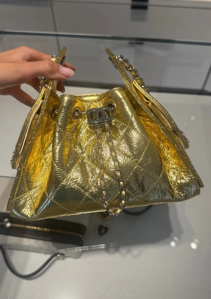 2026 Chanel 25 Mini Hobo Metallic Gold Drawstring Quilted Leather