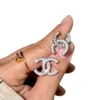 New Chanel CC Crystal Strass Pearl Pierced Stud Earrings Silver