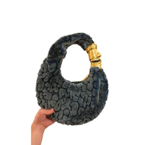 Schiaparelli Small Soufflé blue shearling bag with gold brass face charm handle