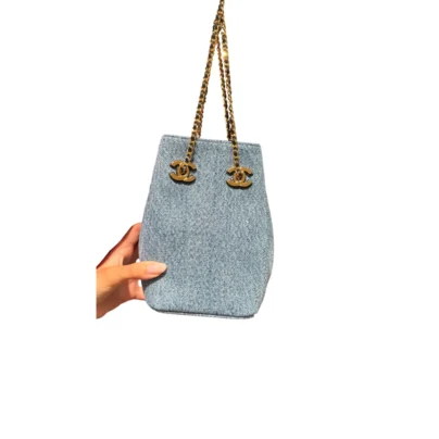Chanel Bucket Bag in Blue Denim and Gold tone Chain strap