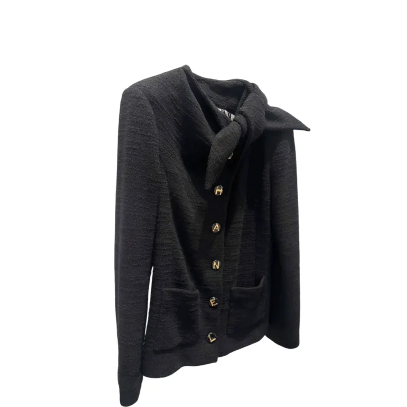 Chanel black tweed bow tie collar jacket Metiers D'Art 2026