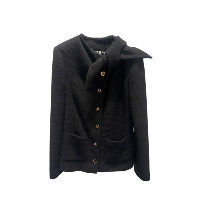 Chanel black tweed bow tie jacket Metiers D'Art 2026