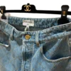 Chanel 26b Blue Denim Jeans with Diamond Quilted Pattern button closeup