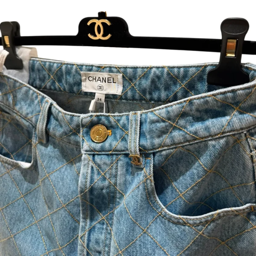 Chanel 26b Blue Denim Jeans with Diamond Quilted Pattern button closeup