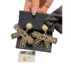 Chanel Crystal Pearl Ribbon Bow Earrings Gold Metal Fall Winter 2025:26