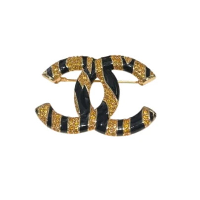 Chanel Zebra Pattern CC Crystal Brooch Black and Gold