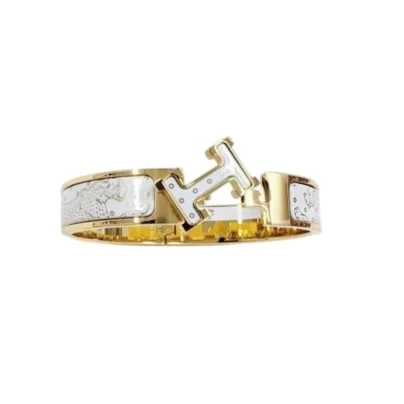 Hermès Clic H Guepards PM Bracelet Yellow gold-plated metal
